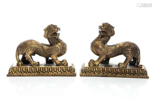 PAIR CHINESE GILT BRONZE RECLINING MYTHICAL BEASTS