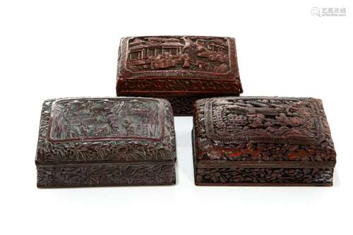 THREE CHINESE CARVED LACQUER RECTANGULAR BOXES