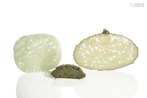 THREE CHINESE JADE PLAQUES AND BROOCH