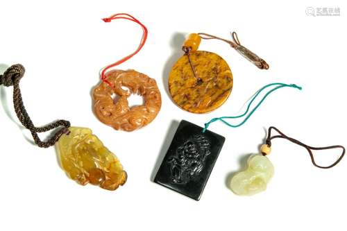 FIVE CHINESE JADE AND STONE PENDANTS