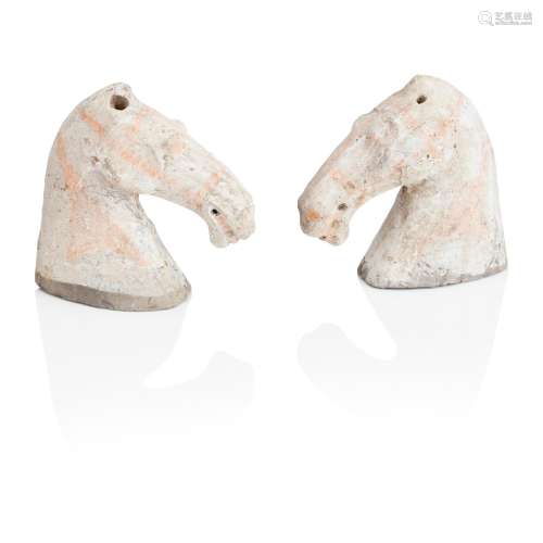 A PAIR OF CHINESE TERRACOTTA HORSES HEADS