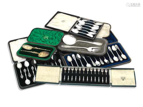 A SET OF TWELVE SILVER AND ENAMEL PICKLE FORKS