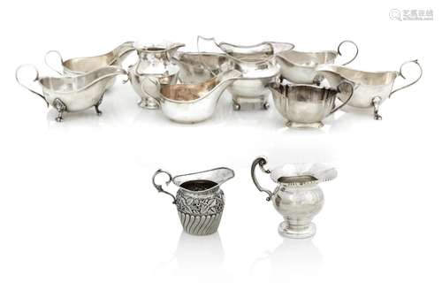 A COLLECTION OF SILVER JUGS AND SAUCEBOATS