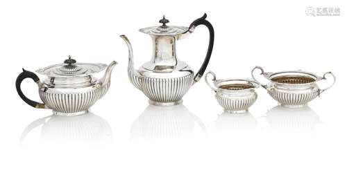 A VICTORIAN FOUR PIECE SILVER TEA SET