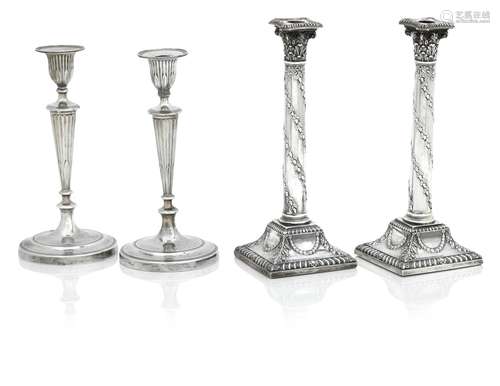 A PAIR OF GEORGE V SILVER CANDLESTICKS