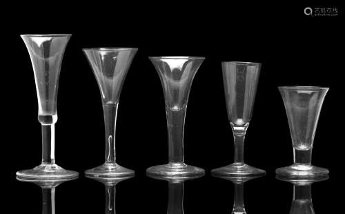 A GROUP OF WINE GLASSES,