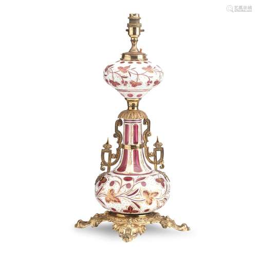 A BOHEMIAN ORMOLU CASED RUBY GLASS TABLE LAMP