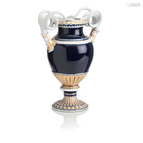 A MEISSEN PORCELAIN  TWO-HANDLED PEDESTAL VASE