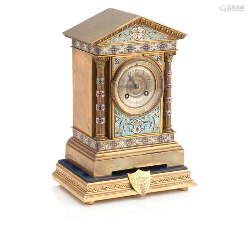 A FRENCH CHAMPLEVE BRASS MANTEL CLOCK