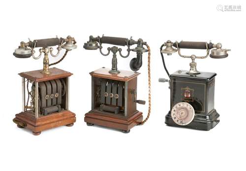 A MAHOGANY CASED HAND CRANK TELEPHONE