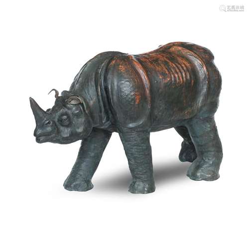 A MID 20TH CENTURY LEATHER MODEL OF A RHINOCEROS