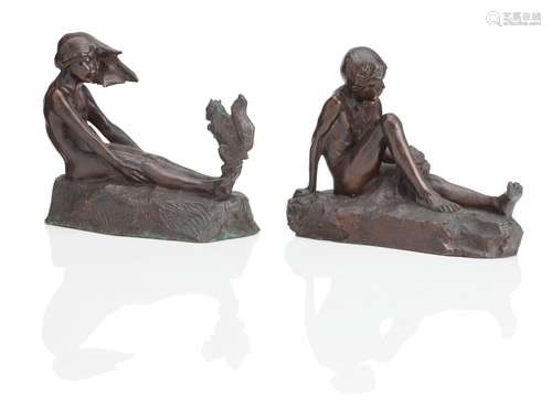 A PAIR OF 20TH CENTURY AMERICAN BRONZE FIGURES OF A SEATED B...