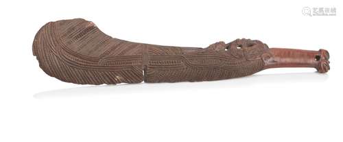 A MAORI CARVED WOOD PATU