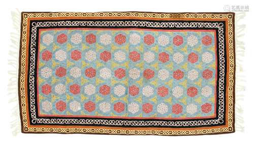 AN IRISH ARTS & CRAFTS NEEDLEWORK COVERLET,