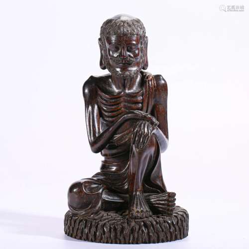A Chinese Carved Rosewood Seated Arhat Qing Dyn.