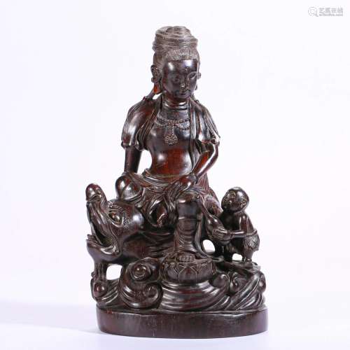 A Chinese Carved Rosewood Guanyin Qing Dyn.