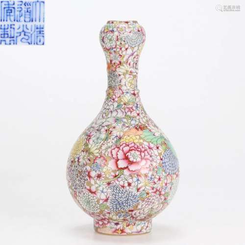 A Chinese Famille Rose Mille Fleur Bottle Vase Qing