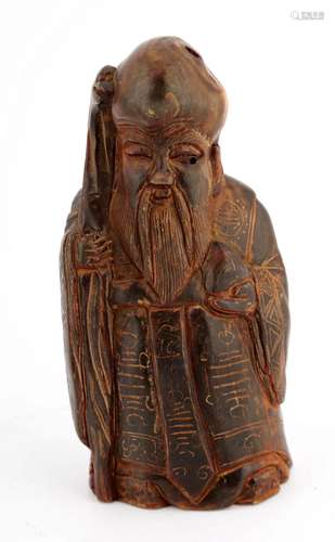 A CHINESE HORN CARVINGS FIGURE OF A GOD OF LONGEVITY