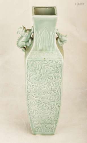 A GREEN GLAZE CARVED DRAGON AND PHOENIX PORCELAIN