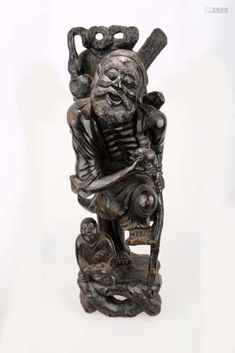 A CHINESE QING DYNASTY JINSHAN WOOD BODHIDHARMA