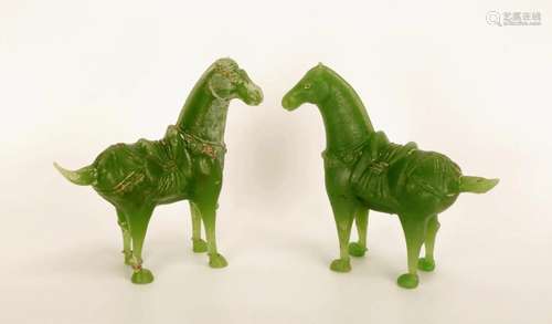 (2) A PAIR OF TANG DYNASTY STYLE GREEN COLOURED