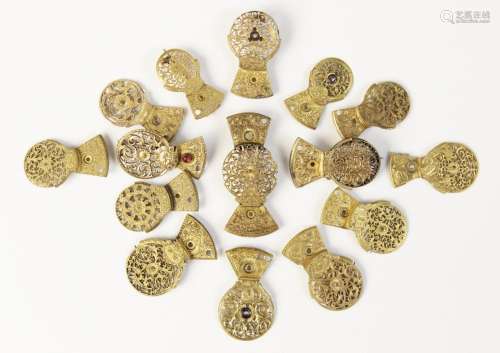 A selection of gilt pierced and engraved pocket watch balanc...