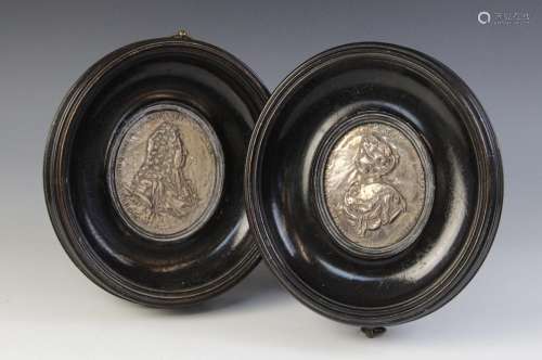 A pair of silver coloured William & Mary commemorative p...