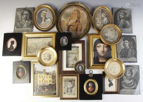 A selection of twenty one picture frames containing an assor...