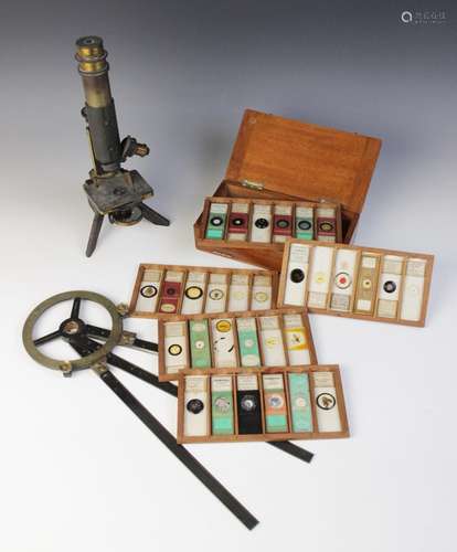 A collection of thirty five microscope specimen slides, late...