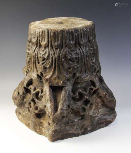A carved stone Corinthian type architectural capital with di...