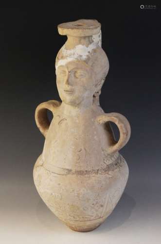 A terracotta water jug, the amphora form jug with loop handl...