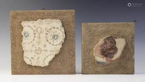 Two polychrome painted fresco fragments; one with circular a...