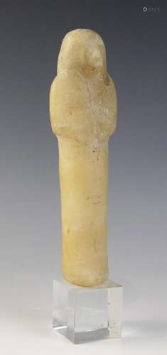 An Egyptian alabaster shabti, some faint traces of the front...