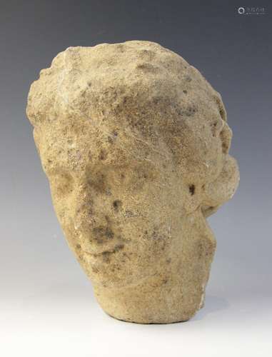 A carved stone head in the classical manner, possibly Venus,...