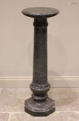 A green variegated marble pedestal, the circular top raised ...