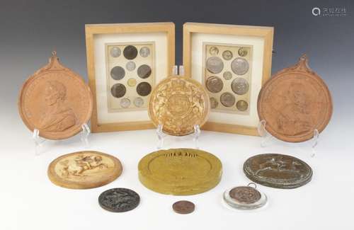 A collection of historical coin casts, ranging from 1st cent...