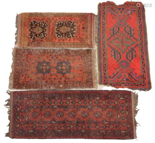 Four assorted small Persian pattern hand knotted wool rugs, ...