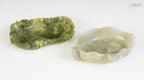 * A Chinese carved Jade lotus dish, the pale green jade carv...