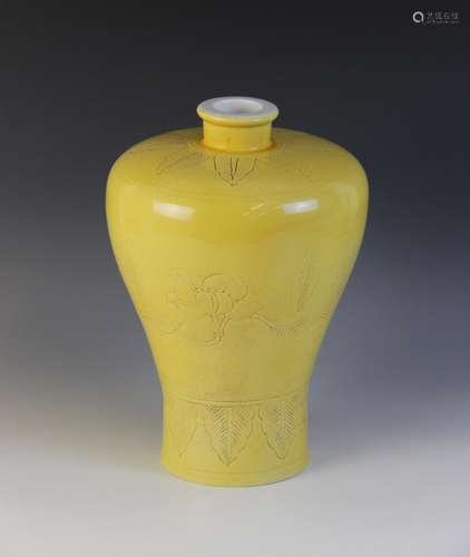 * A Chinese monochrome sgrafitto vase, of meiping form with ...