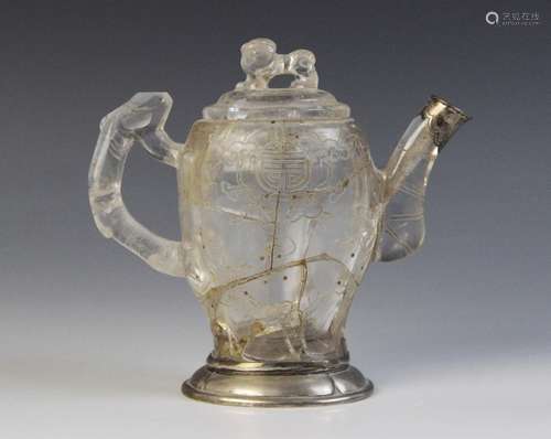 A Chinese carved rock crystal teapot and cover, the bamboo m...