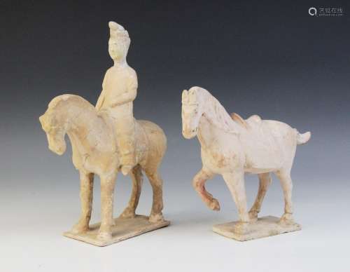 A Chinese pottery model of figure riding a horse, possibly T...