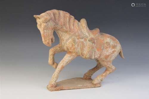 A Chinese pottery model of a horse, possibly Tang dynasty, m...
