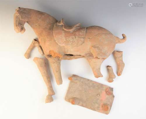 A large Chinese pottery model of a horse, possibly Tang dyna...