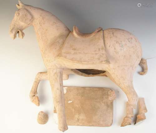 A large Chinese pottery model of a horse, possibly Tang dyna...