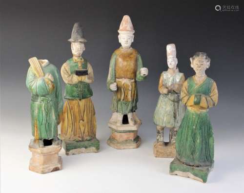 Five Chinese Sancai glazed attendants, possibly Ming dynasty...