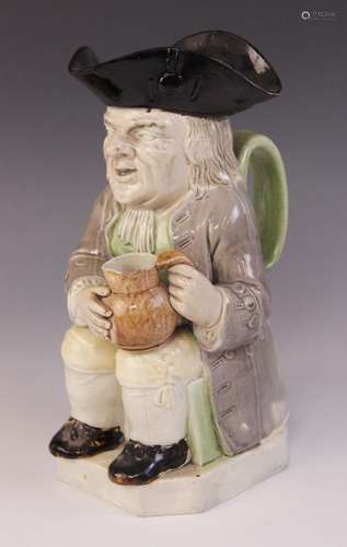 A Staffordshire pearlware Toby Jug, circa 1790, of tradition...