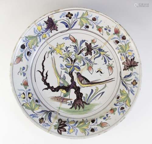 An English Delft charger, 18th century, decorated in the Faz...