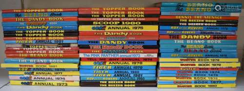 Sixty mainly 1970s childrens annuals with humour, sporting a...
