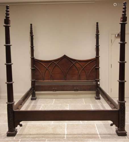 * A Gothic revival hardwood four poster bed, late 20th centu...