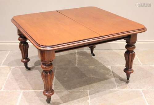 * A Victorian mahogany extending dining table, the rectangul...
